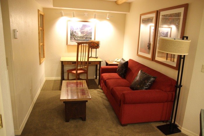 Either a second living space or a quasi-bedroom, just off the kitchen