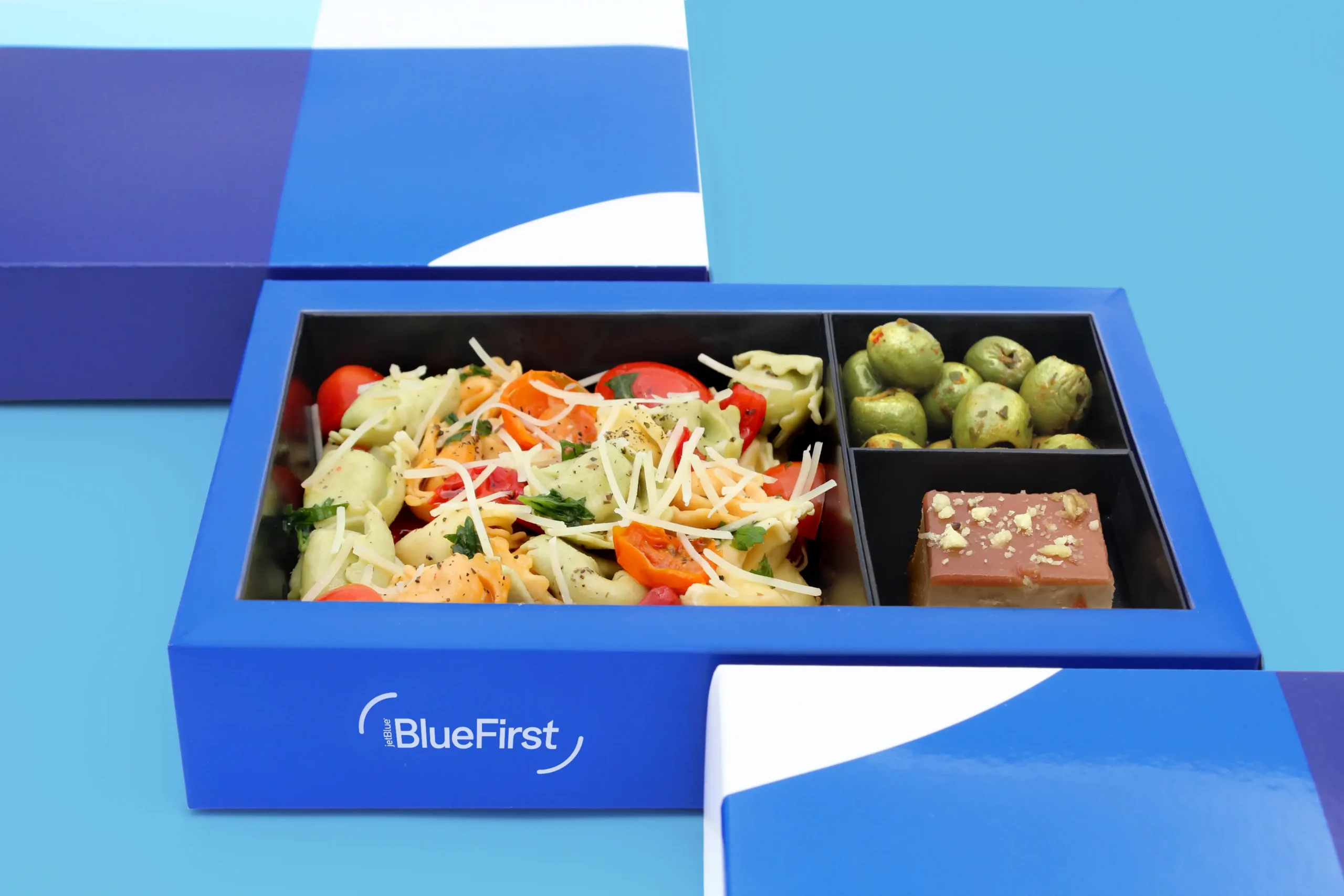 Bento-style FirstFare meal served in JetBlue BlueFirst first class